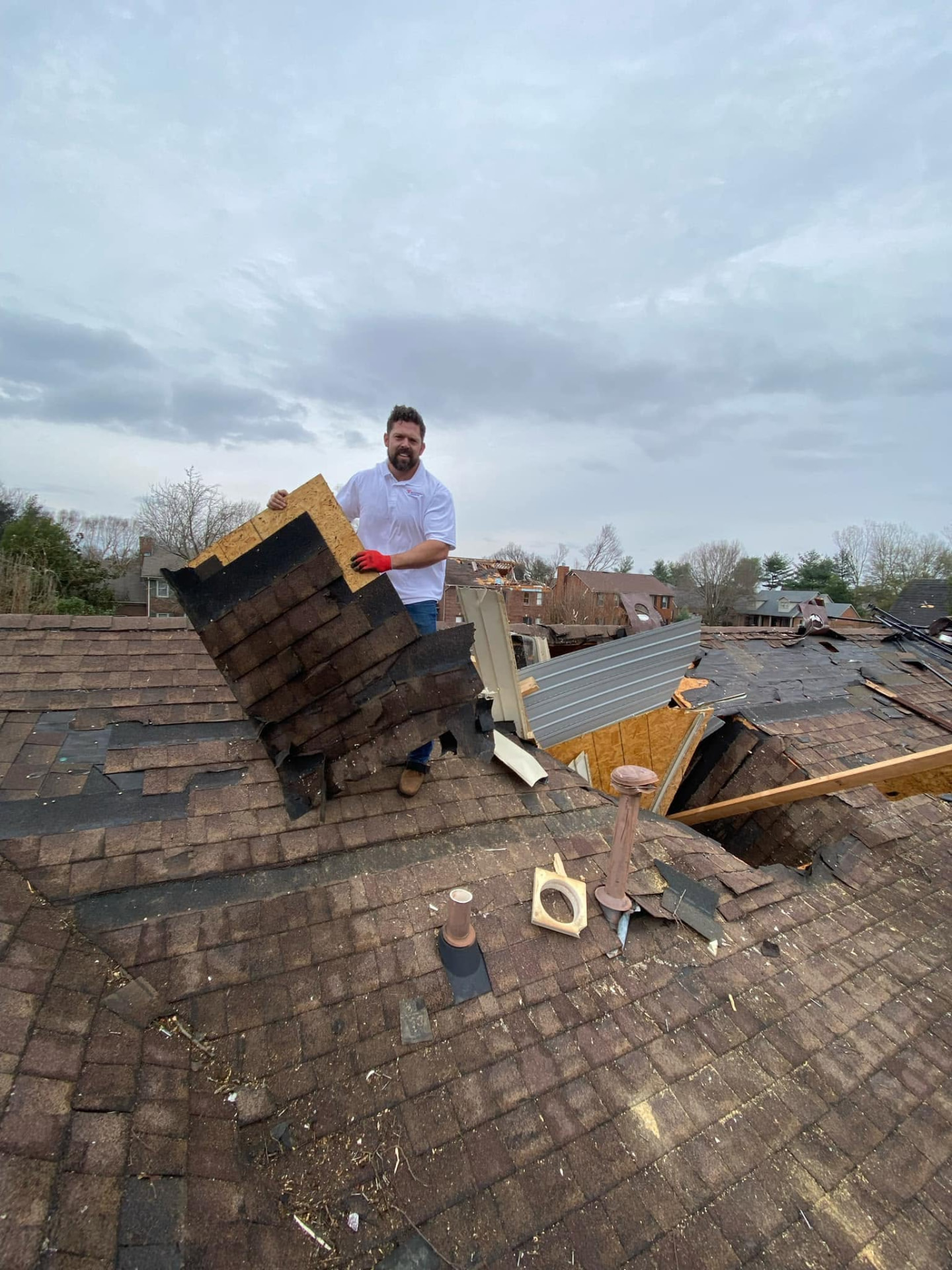 Freedom Contracting contractor inspecting structural conditions during a residential construction project in Bowling Green, Kentucky